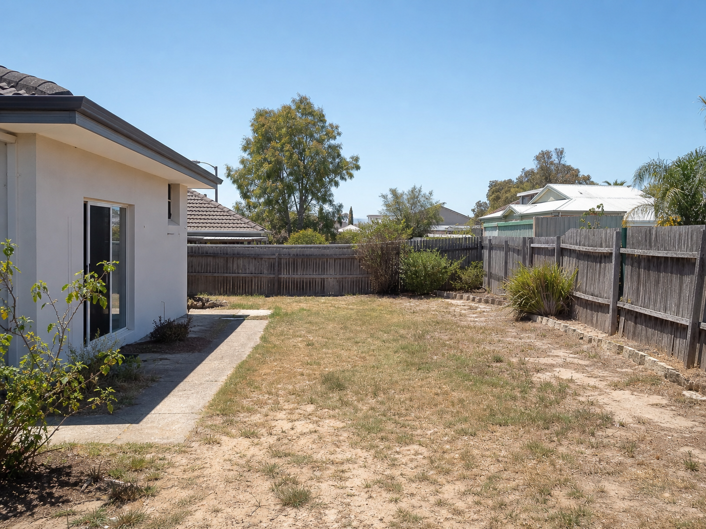 Illustrative concept of a suburban backyard before coordinated outdoor work